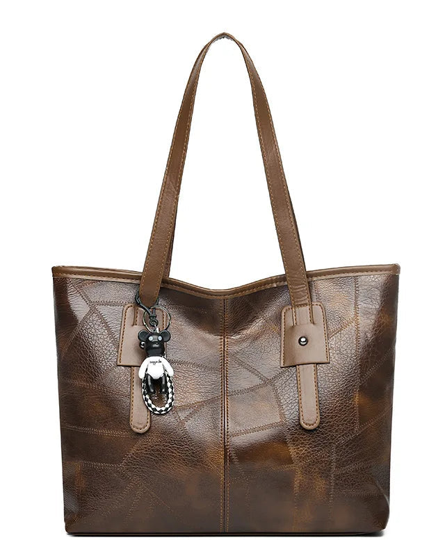 Lumina Wear Victoria vintage-inspired spacious tote bag in khaki with keychain accent, stylish handbag for everyday use.