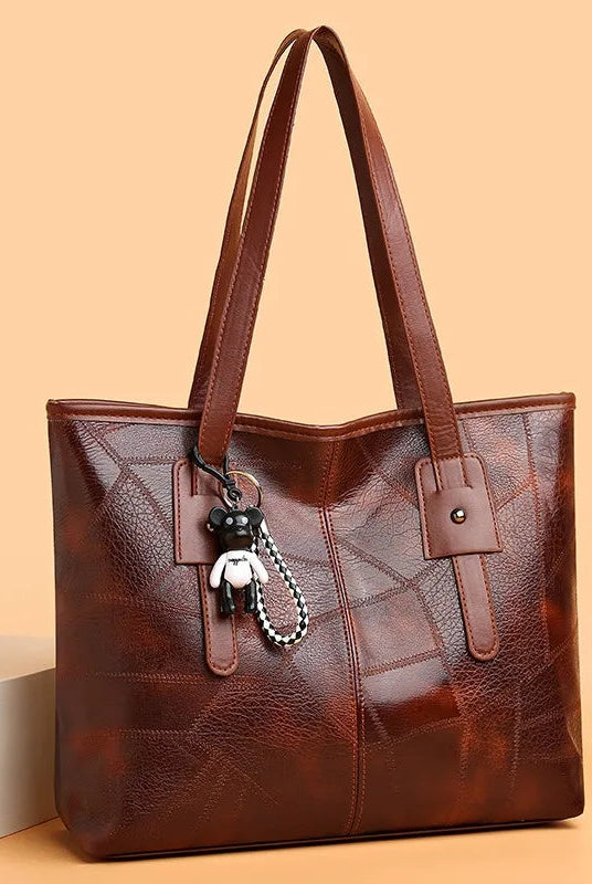 Victoria vintage-inspired spacious tote bag with keychain accent by Lumina Wear, in khaki with hand-stitched details.