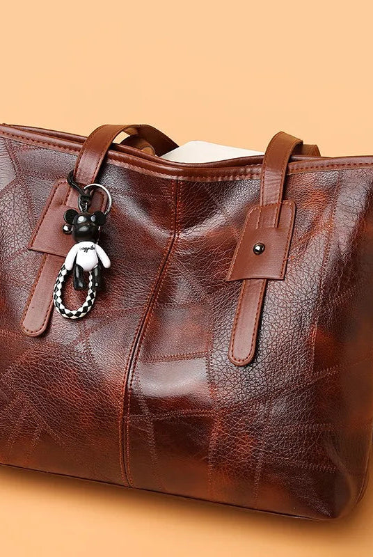 Lumina Wear Victoria vintage-inspired spacious tote bag in khaki with keychain accent, stylish handbag with ample storage.