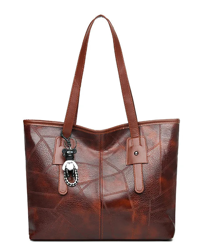 Lumina Wear Victoria vintage-inspired spacious tote bag in khaki with keychain accent, stylish handbag for everyday use.