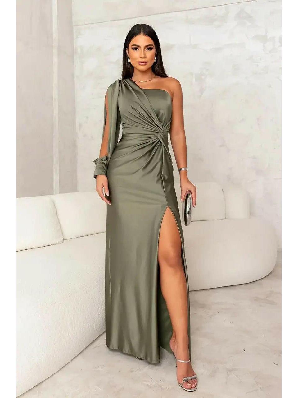 Violet Lumina Vancouver evening maxi dress in teal, flowing fabric, with elegant design and sleeveless style for formal occasions.