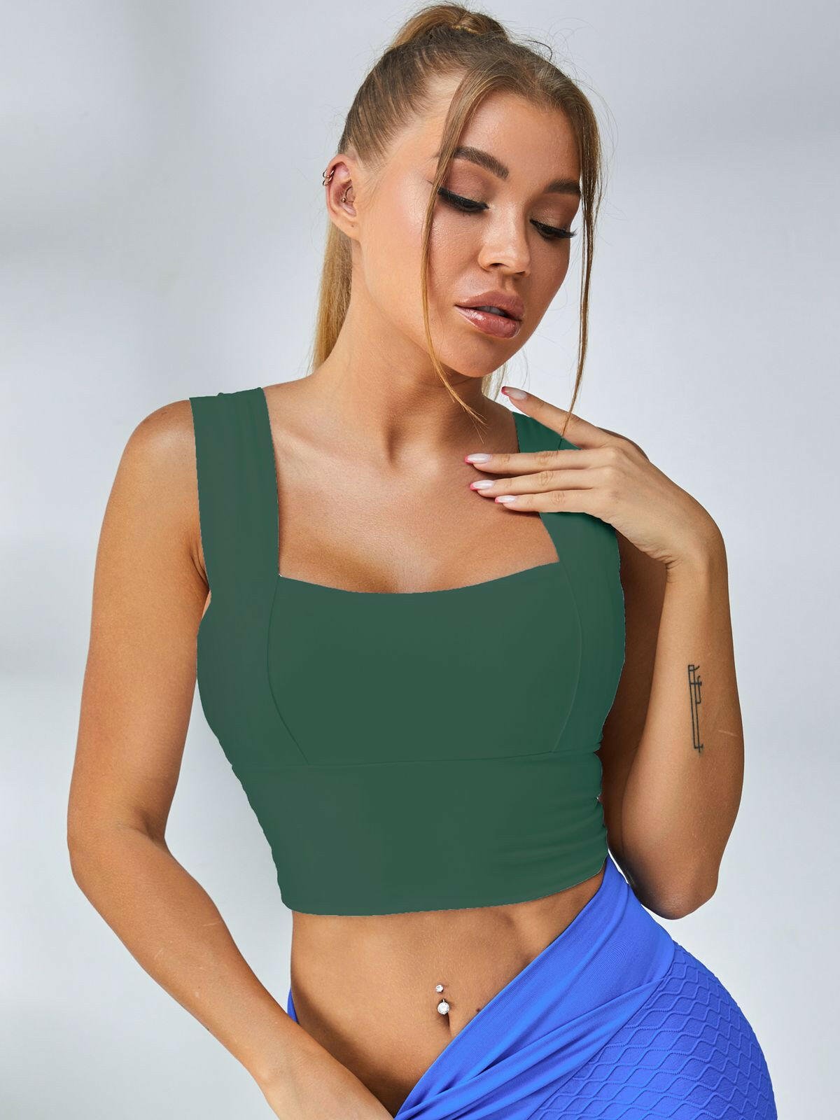 White Lumina Vancouver sports bra with wide shoulder straps, designed for comfort and support during workouts.