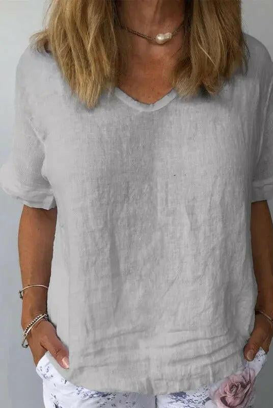 Light blue women's cotton casual top by Lumina Wear, featuring a relaxed fit and soft fabric, ideal for everyday wear.