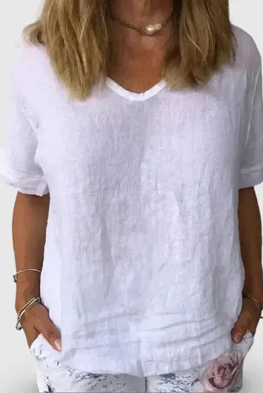 Light blue women's cotton casual top by Lumina Wear, featuring a relaxed fit and simple design, perfect for everyday wear.