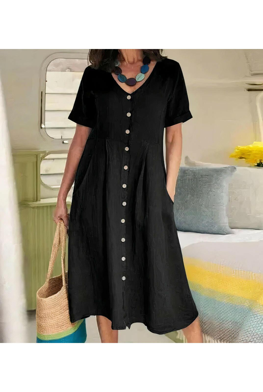 White Yasmin™ buttoned dress by Lumina Wear, casual and effortless style, displayed on a mannequin.