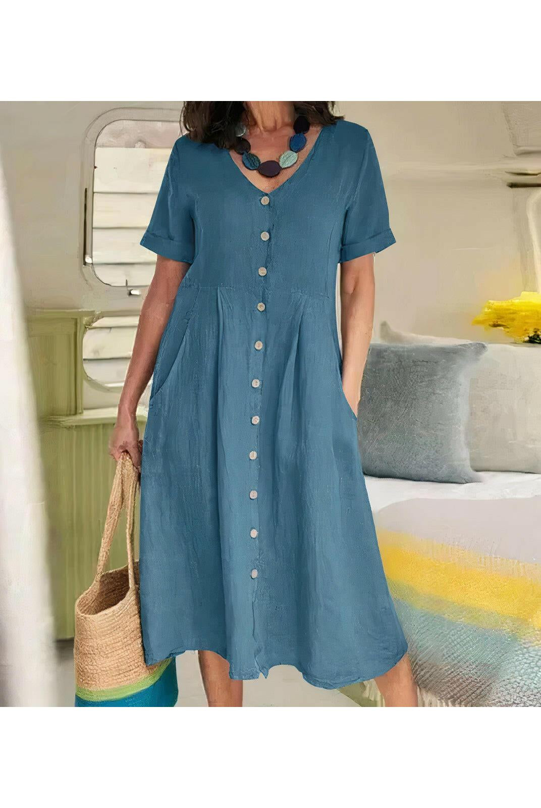 White Yasmin™ Effortless Buttoned Dress by Lumina Wear, styled on a model, perfect for casual or semi-formal occasions.