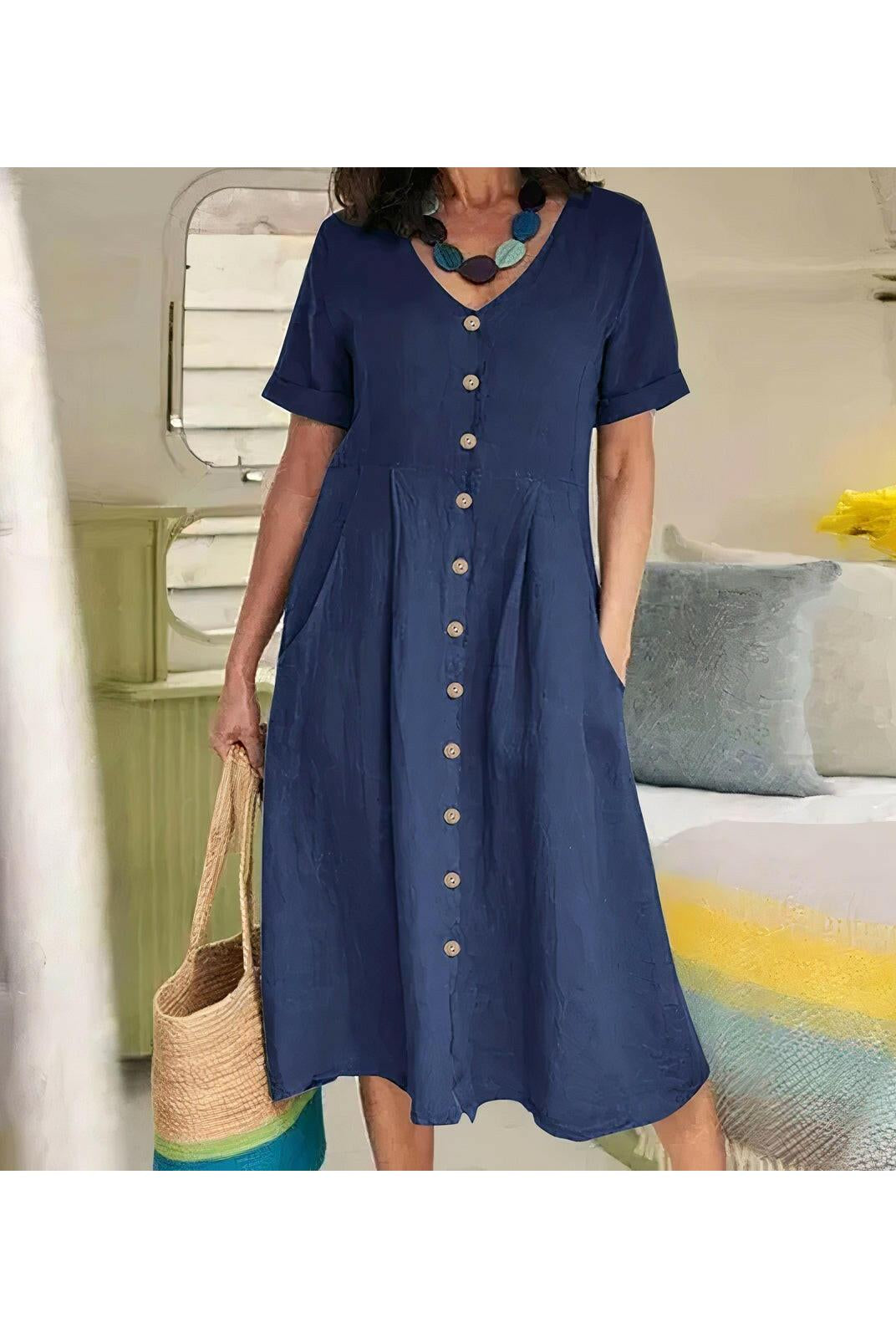White Yasmin™ Effortless Buttoned Dress by Lumina Wear, featuring a sleek design and button details, perfect for casual or chic occasions.
