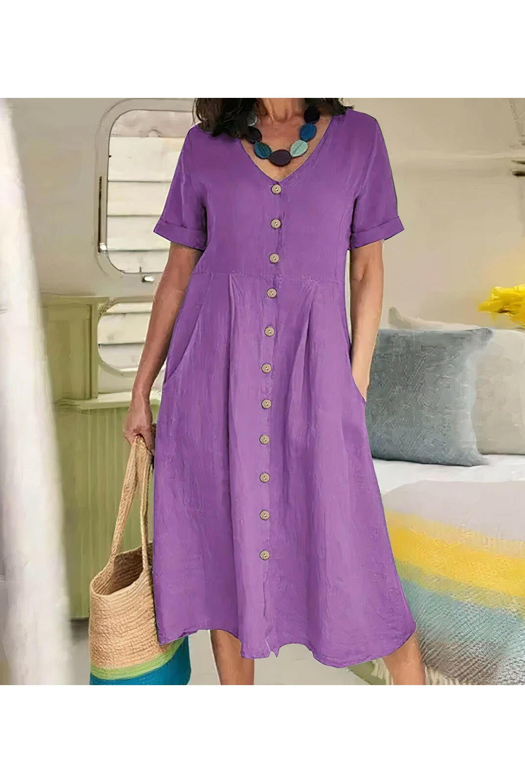 White Yasmin™ buttoned dress by Lumina Wear, casual and stylish, shown on a model with a relaxed fit and elegant design.
