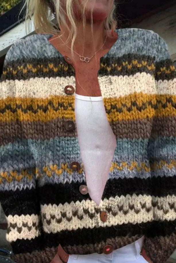 Colorful Lumina Wear Zaddie cardigan in size S, featuring vibrant knit patterns and a cozy fit, displayed on a hanger.