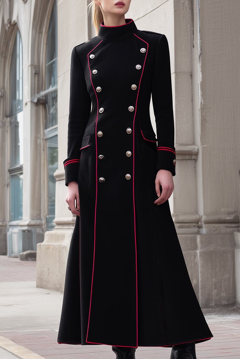 Black double-breasted military-inspired long coat with red piping by Lumina Vancouver, displayed on a mannequin.