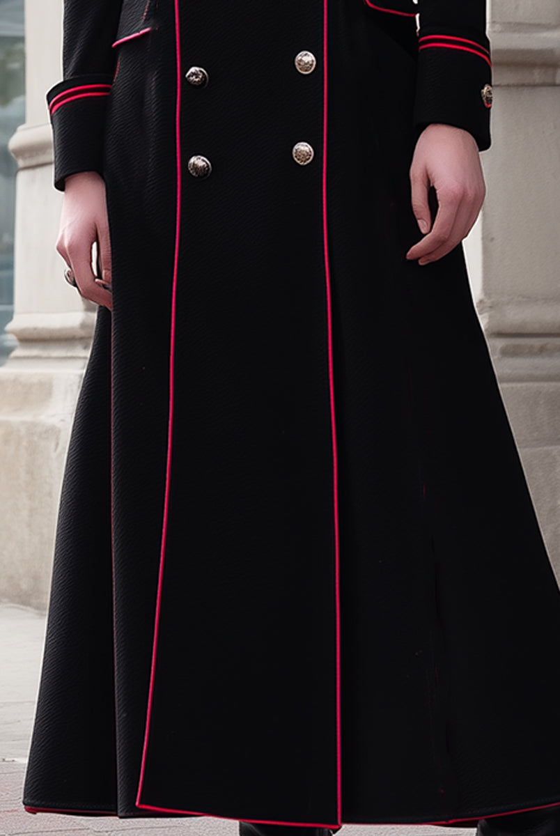 Black double-breasted military-inspired long coat with red piping by Lumina Vancouver, shown on a model.