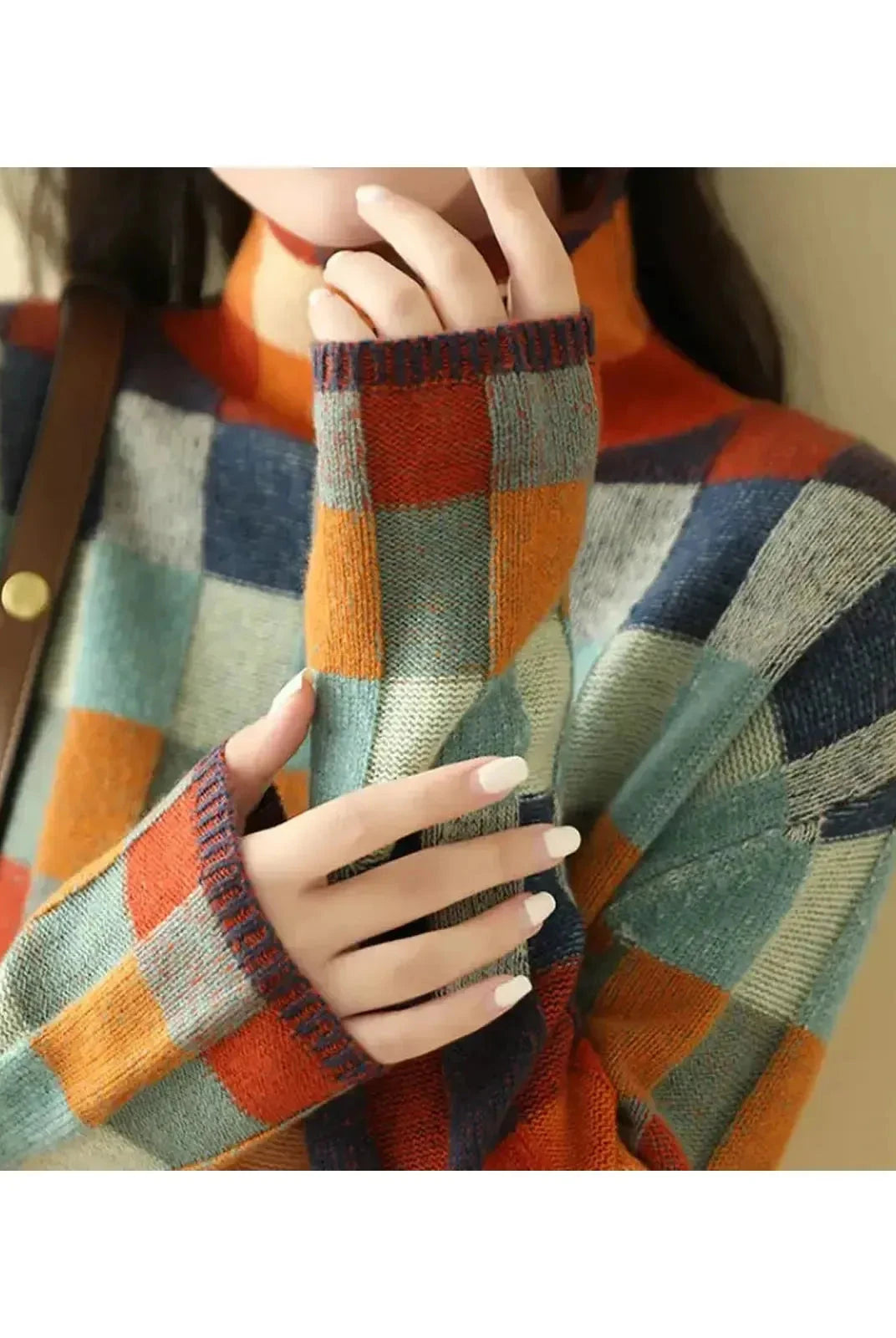 Lumina Wear Zuna sweater featuring a cozy knit design in a neutral color, perfect for casual or layered winter outfits.