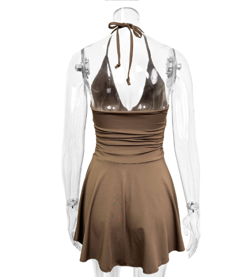 Lumina Vancouver Nova sleeveless A-line mini dress in vibrant fabric, shown on a mannequin with stylish design details.