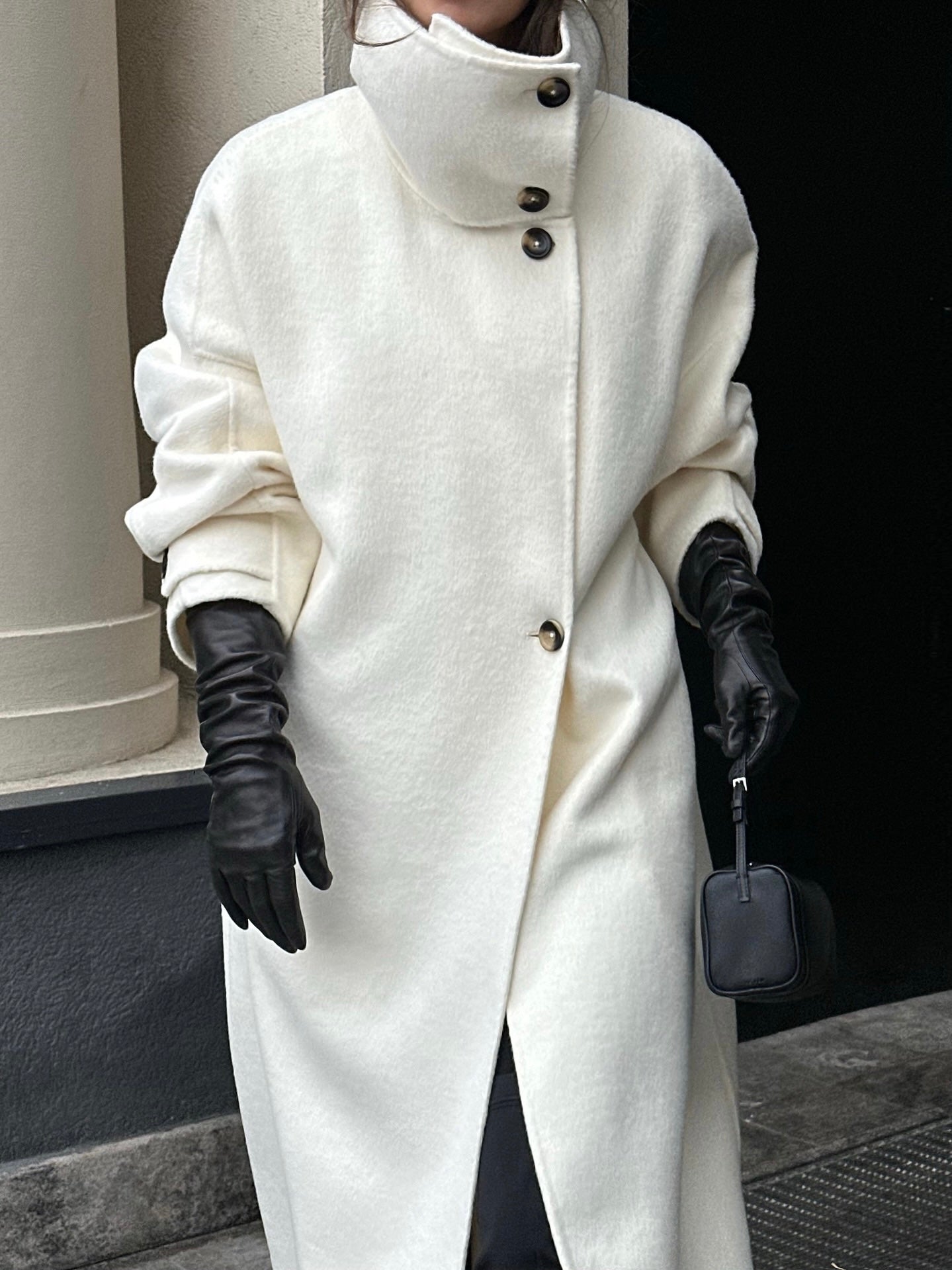 Elegant structured longline coat with high-neck design from Lumina Wear, featuring a tailored fit and sophisticated style.