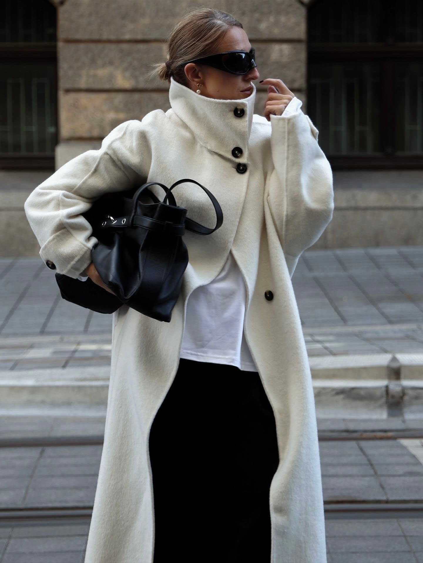 Elegant structured longline coat with high-neck design by Lumina Wear, featuring a tailored fit and sophisticated style.