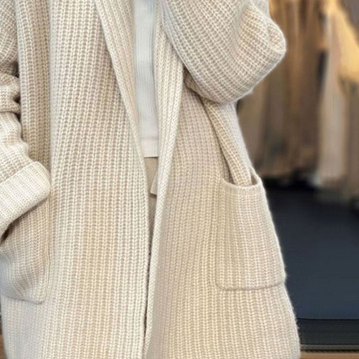 Lumina Wear Amelia cozy oversized knitted cardigan with integrated scarf, soft textured fabric and relaxed fit.