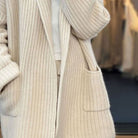 Lumina Wear Amelia cozy oversized knitted cardigan with integrated scarf, soft textured fabric and relaxed fit.