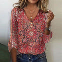 Bohemian print summer blouse with flowing fit from Lumina Wear, featuring vibrant patterns and lightweight fabric.
