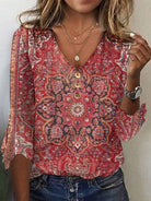 Audrey Lumina bohemian print summer blouse with flowing fit and relaxed sleeves, perfect for casual warm-weather wear.