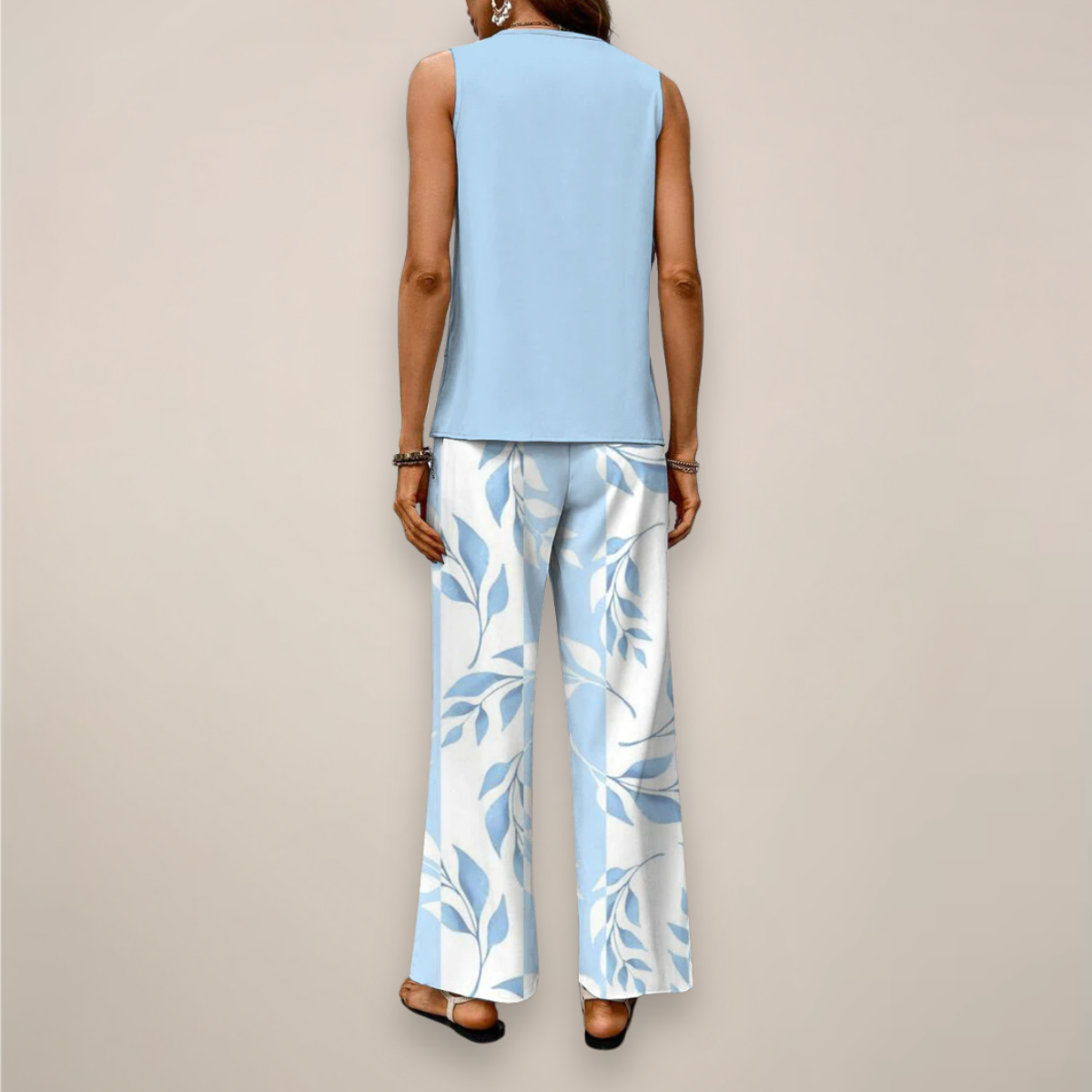 A woman wearing the Lumina Wear Ava vibrant printed wide-leg set with relaxed fit, showcasing colorful patterns and comfortable style.