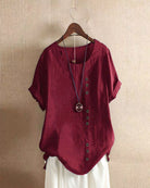 Light beige Beatrice relaxed summer blouse by Lumina Wear featuring button details and a flowy, casual fit.