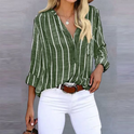 Light blue and white striped Lumina Wear Bella relaxed button blouse, casual T-shirt style with a comfortable fit.