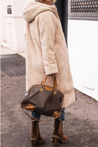 Lumina Wear Carina reversible long winter coat for women, featuring cozy warmth and stylish design, perfect for cold weather.