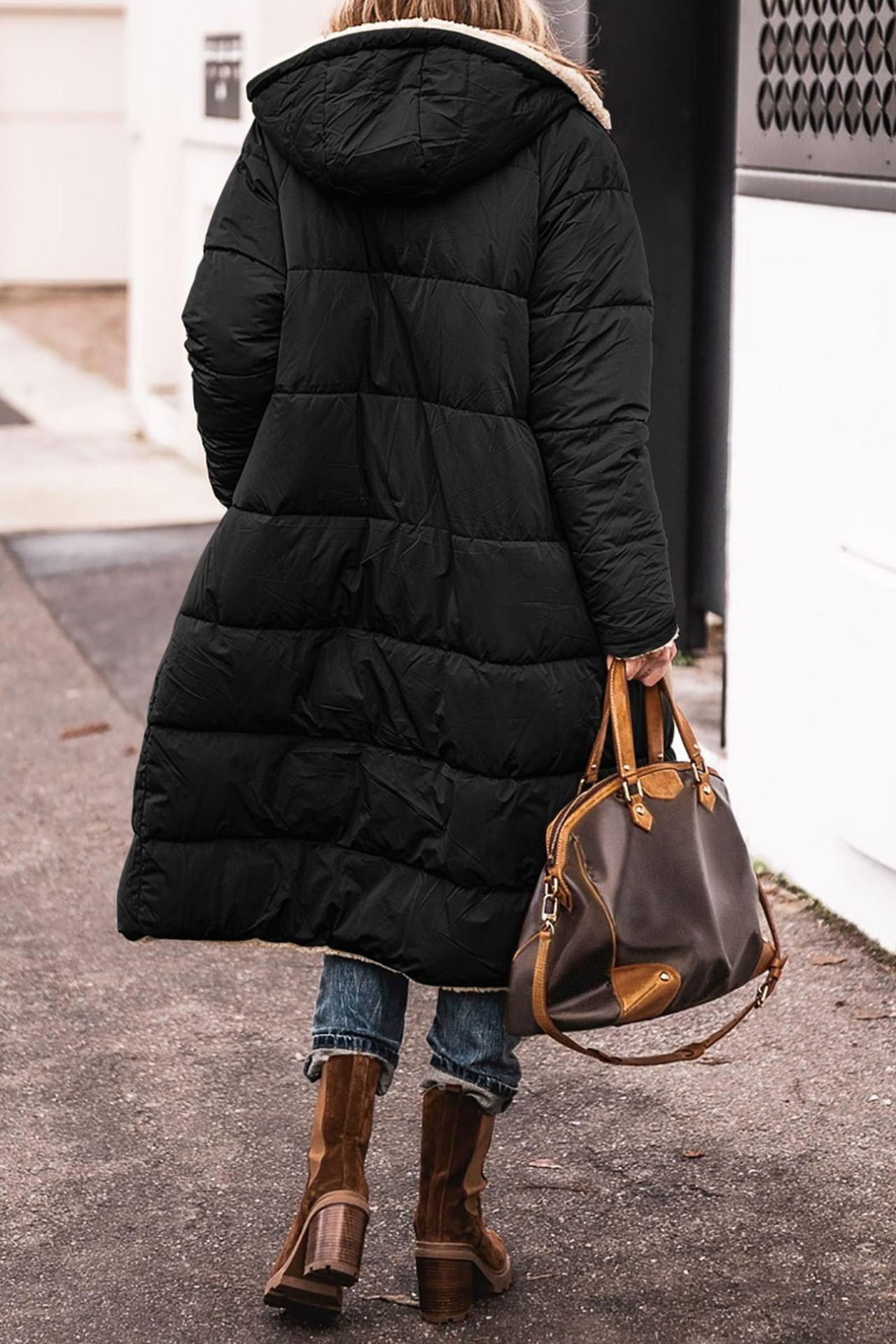 Carina Lumina Wear elegant reversible long winter coat for women with cozy warmth, featuring stylish design and plush interior.