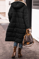 Carina Lumina Wear elegant reversible long winter coat for women with cozy warmth, featuring stylish design and plush interior.
