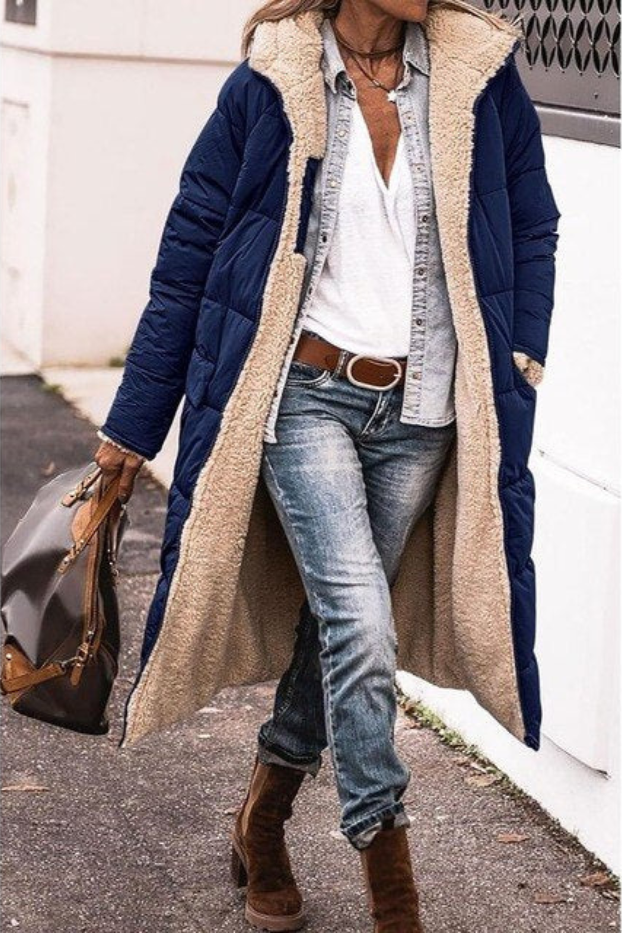 Elegant reversible long winter coat for women by Lumina Wear, showcasing cozy warmth and stylish design in a high-quality image.