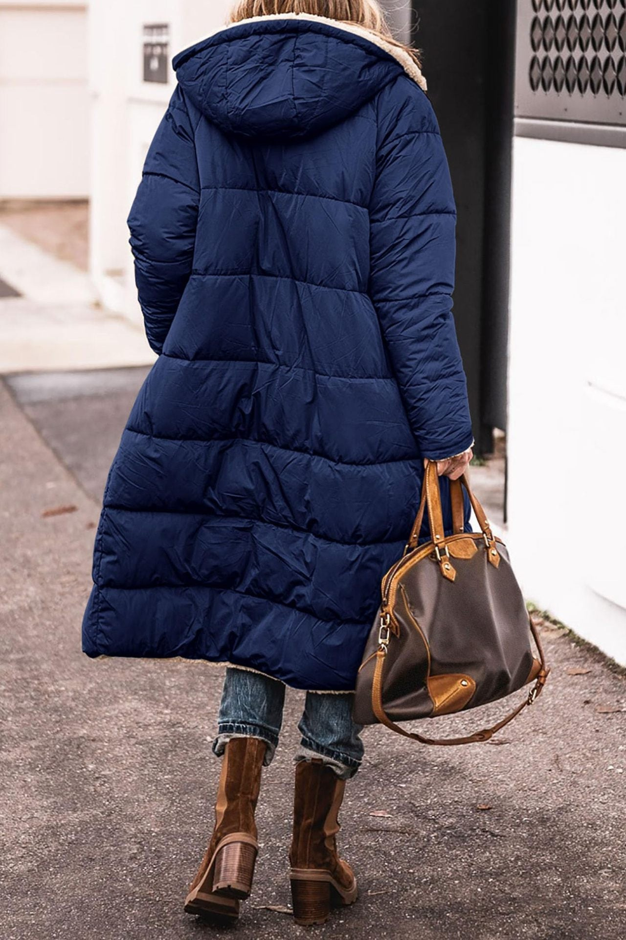 Elegant reversible long winter coat for women by Lumina Wear, featuring cozy warmth and stylish design.