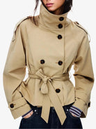 Woman wearing Lumina Wear Cathryn structured short belted trench coat with waist tie, showcasing a stylish women's coat and jacket.