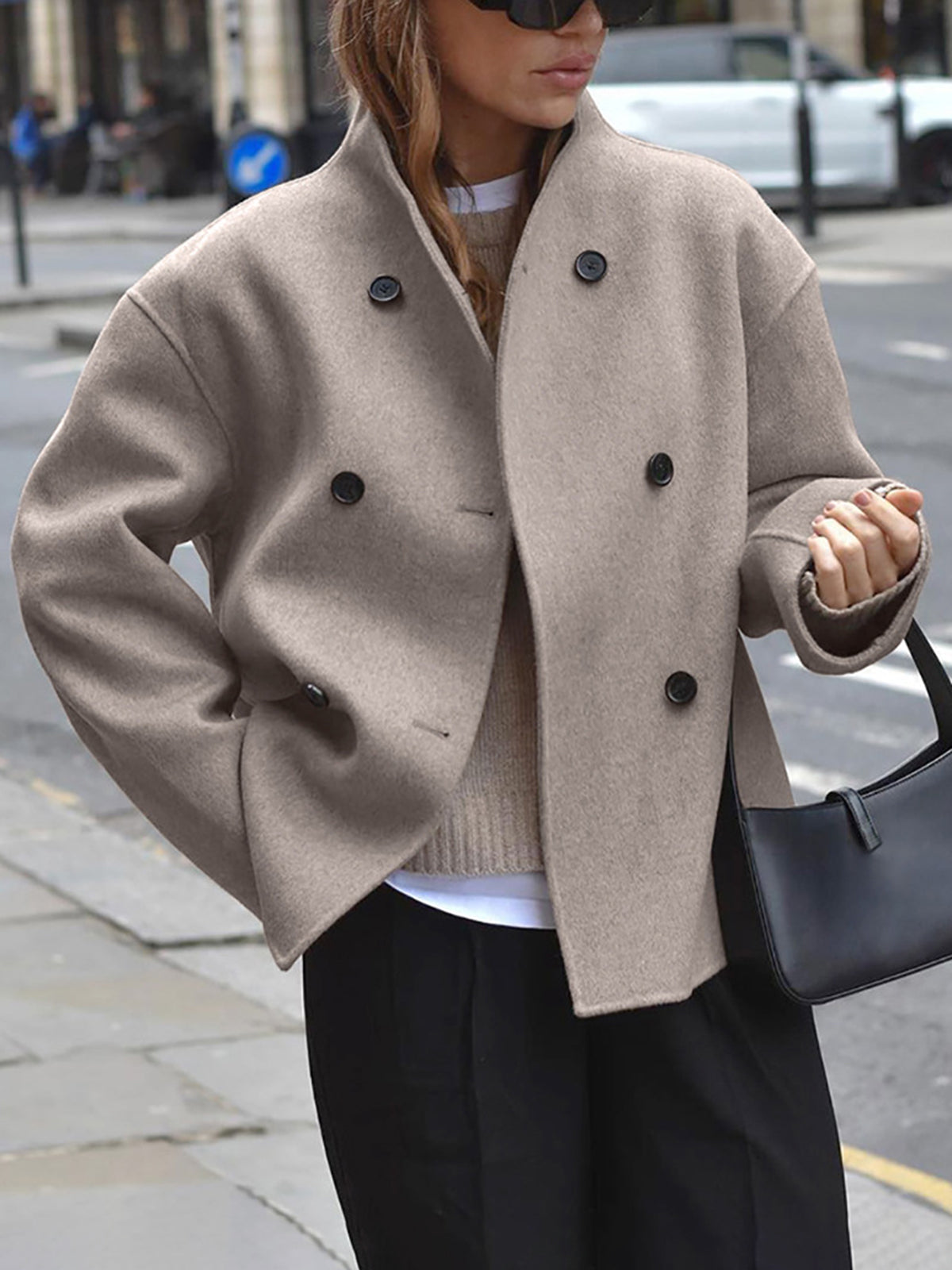 Black Charlene Lumina Wear peacoat with double-breasted design and stand collar, stylish and warm for fall and winter.