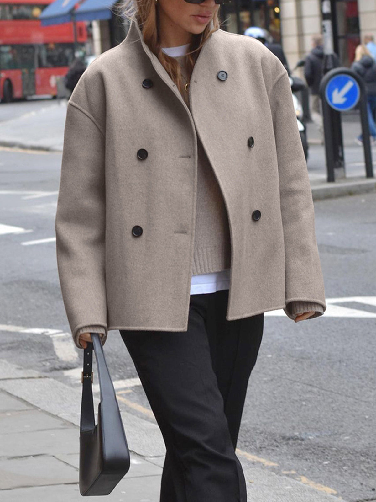 Charlen Lumina black double-breasted peacoat with stand collar, stylish outerwear for a sophisticated winter look.