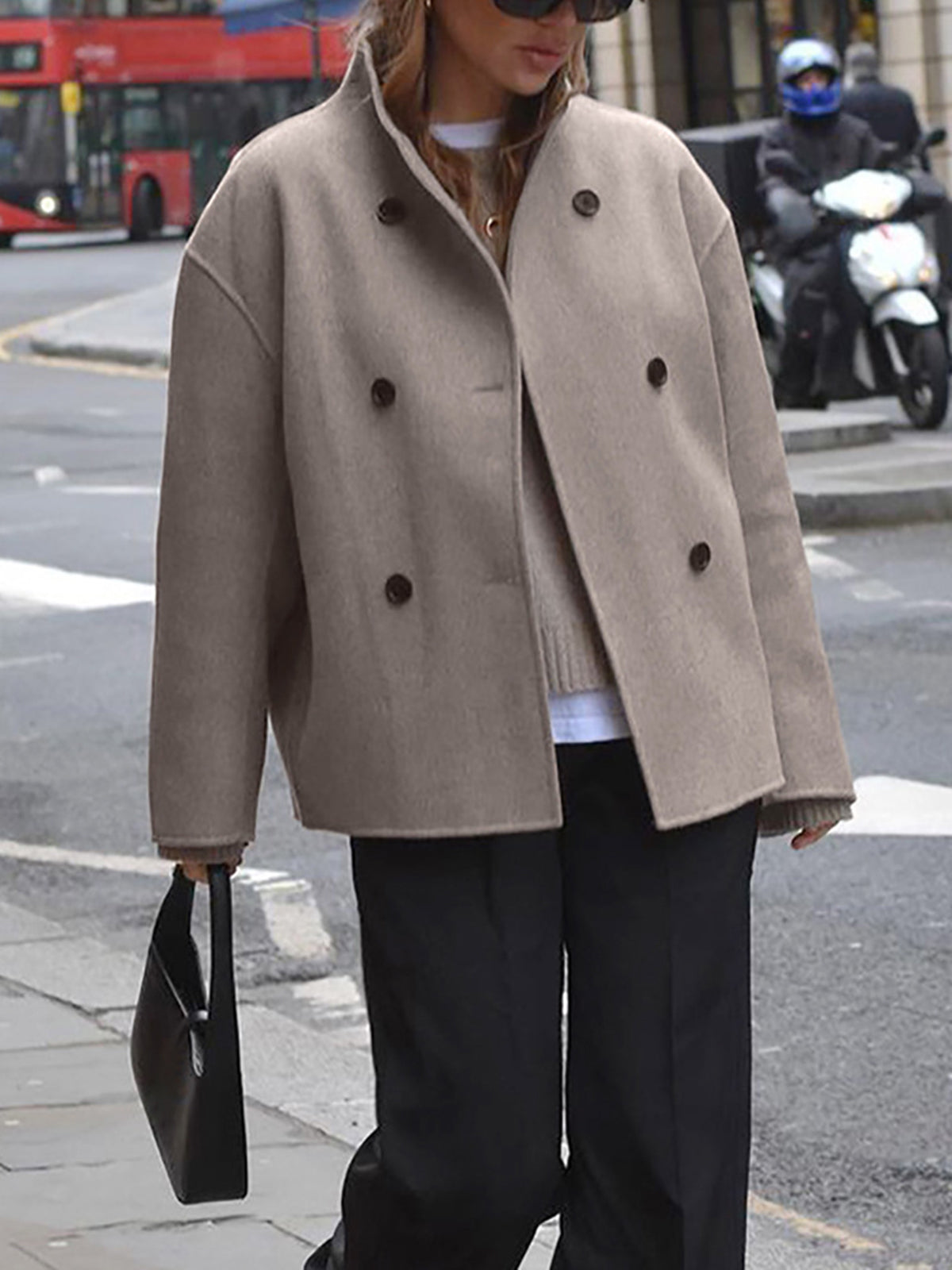 Black Charlene double-breasted peacoat with stand collar by Lumina Wear, shown on model with buttons and tailored fit.