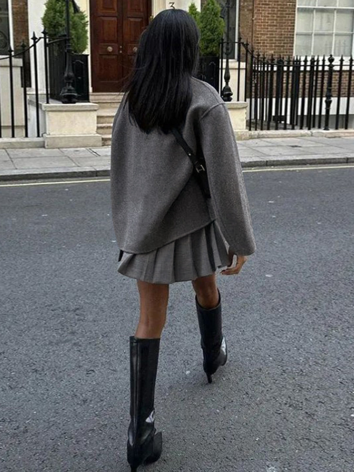 Black Charlene Lumina Wear double-breasted peacoat with stand collar, stylish and warm for cold weather.