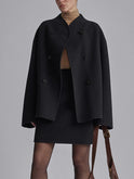 Black Charlene double-breasted peacoat with stand collar by Lumina Wear, shown on a model with front view and button details.