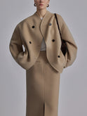 Black Charlene double-breasted peacoat with stand collar by Lumina Wear, showing front view and tailored fit.