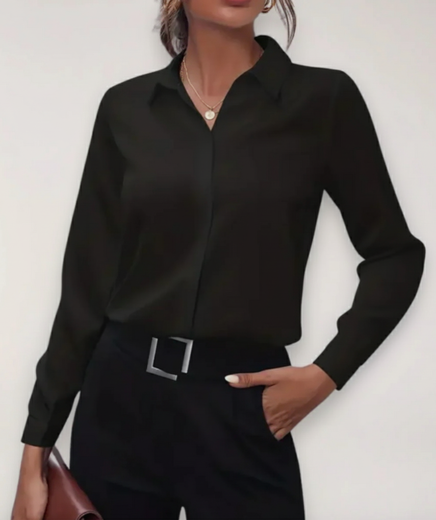 Charlotte Lumina Wear elegant tailored blouse with button detail, featuring a fitted design and classic collar for sophisticated style.