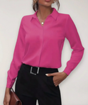 Elegant tailored Charlotte blouse by Lumina Wear featuring button details, displayed on a model in a professional setting.