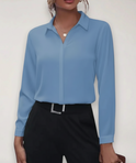 Elegant tailored Lumina Wear Charlotte blouse with button details, featuring a sophisticated fit and classic design.