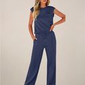 Charlotte Lumina relaxed fit two-piece pants set with drawstring, featuring comfortable, casual style and soft fabric.