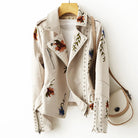 Women's leather jacket by Lumina Wear featuring floral embroidery, silver studs, and edgy design details.