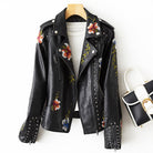 Women's leather jacket by Lumina Wear featuring edgy floral embroidery and silver studs, stylish and bold for modern fashion.