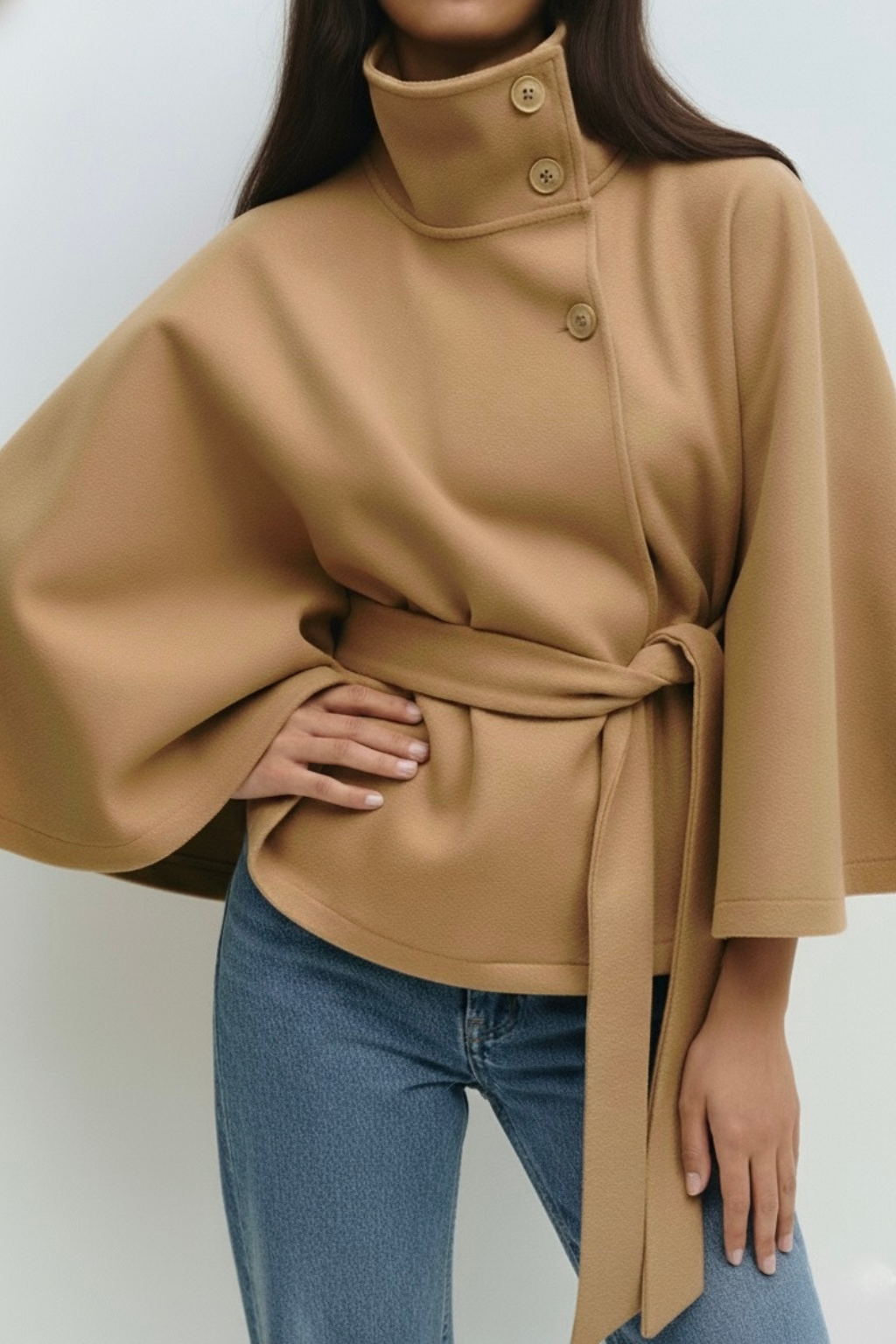 Lumina Wear Chloe high-neck camel cape coat for women, stylish jacket with elegant design and detailed stitching.