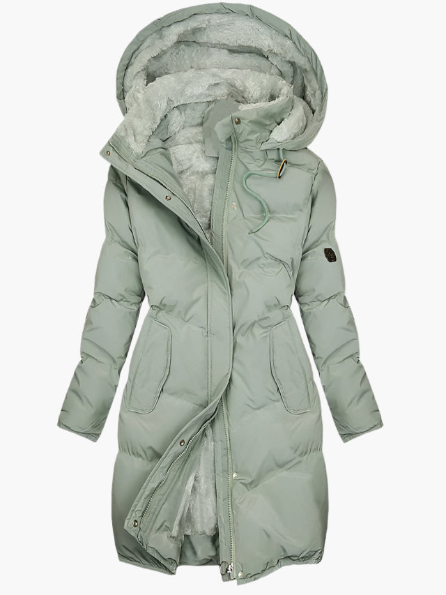 Lumina Wear Chloe elegant quilted hooded winter coat with tailored fit, showcasing its stylish design and cozy fabric.