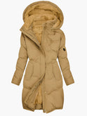 Lumina Wear Chloe quilted winter coat with hood, tailored fit, stylish design, and warm insulation for cold weather.