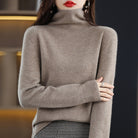 Lumina Wear Chloe glamorous turtleneck sweater in soft wool blend with a cozy fit, shown in a stylish fashion setting.