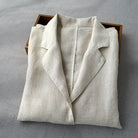 Lumina Wear women's relaxed fit linen blend blazer with structured lapel, beige color, tailored design, and front pockets.
