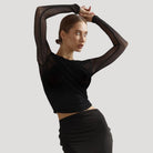 Elegant sheer wrap blouse by Lumina Wear featuring a flattering fit and stylish design, perfect for sophisticated fashion.